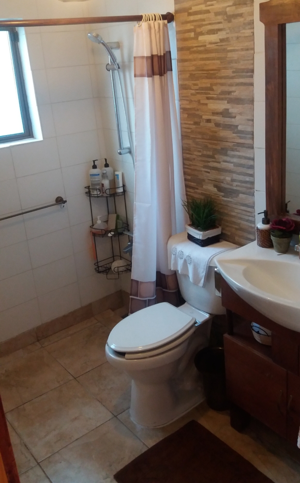 adaptación de ducha a nivel en baño